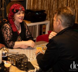 Interactive entertainment can give guests time to rest and refresh at a party. Laura E. West fortune-teller. Photo credit David Campbell.